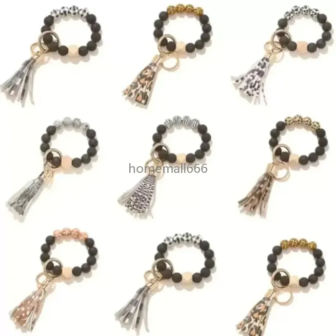 Moda rosted drewniana bransoletka bransoletka klęska przyjęcie przychylność Wzorzec wisiorek Tassel Bracelets Key Girl Key Ring Pasek 7 kolorów aa