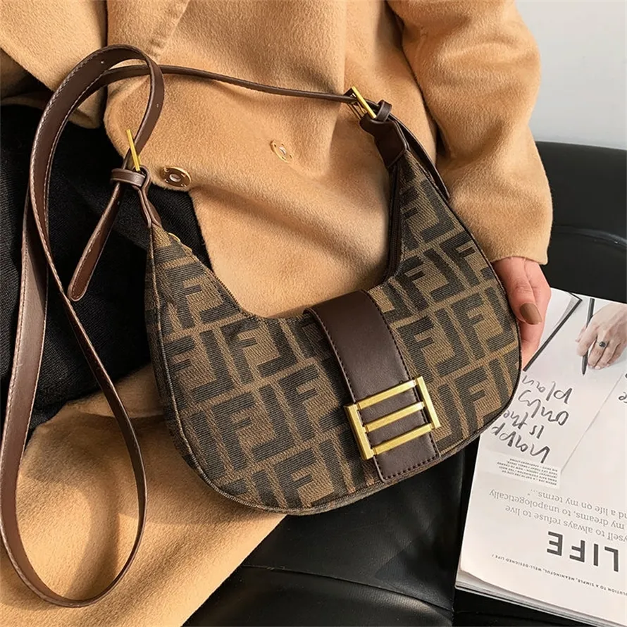 20% KORTING 2022 hoge kwaliteit nieuwe mode trendy tassen club zadel veelzijdig oksel Single Shoulder Messenger Canvas dames