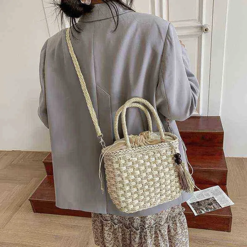 LIUS Luxury Designer Bag Beach Straw Female Fashion National Style Literature and Art Tassel Bucket Leisure Woven Portable Shoulder handbag