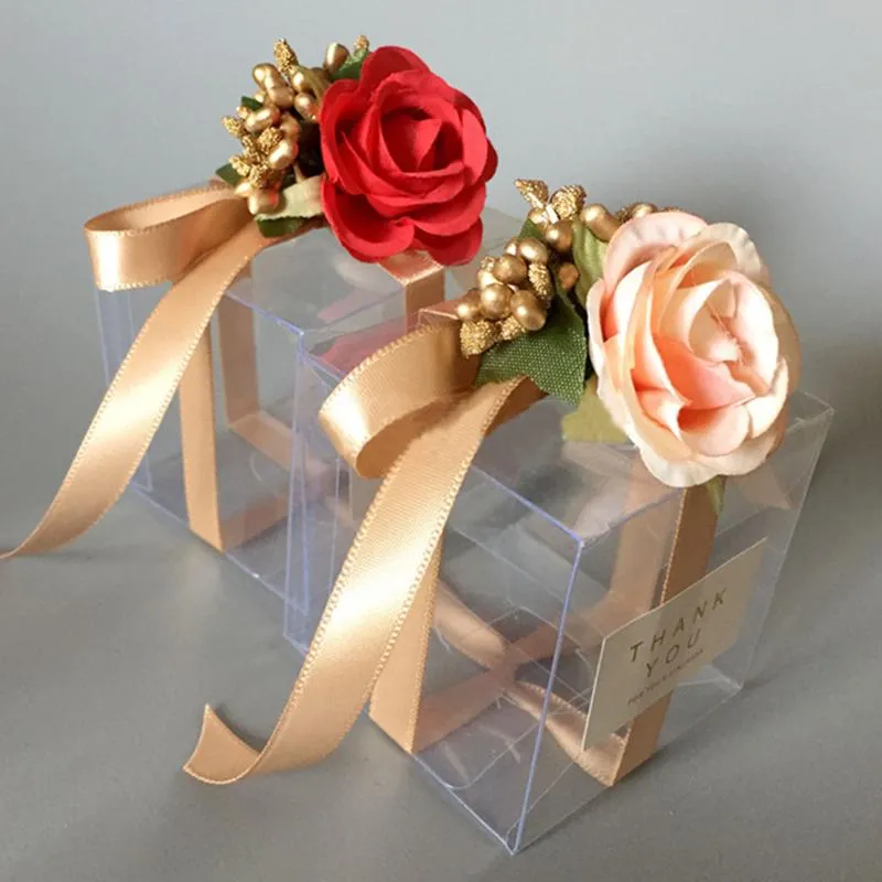 Cadeau cadeau 10pcs / lot boîtes de bonbons PVC transparent faveurs de mariage et cadeaux boîte carrée ruban de fleur emballage romantique sac cadeau