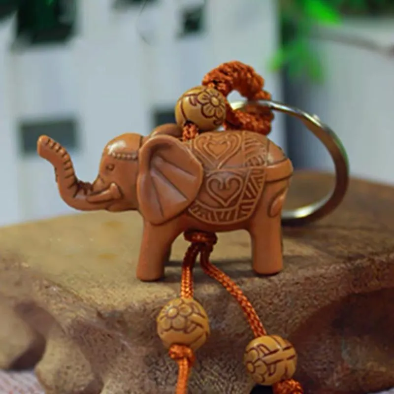 キーホルダー1ピース象のペンダントキーホルダー木製の彫刻豊かなラッキー動物のキーチェーンペンダント女性バッグぶら下げチャームホームリング