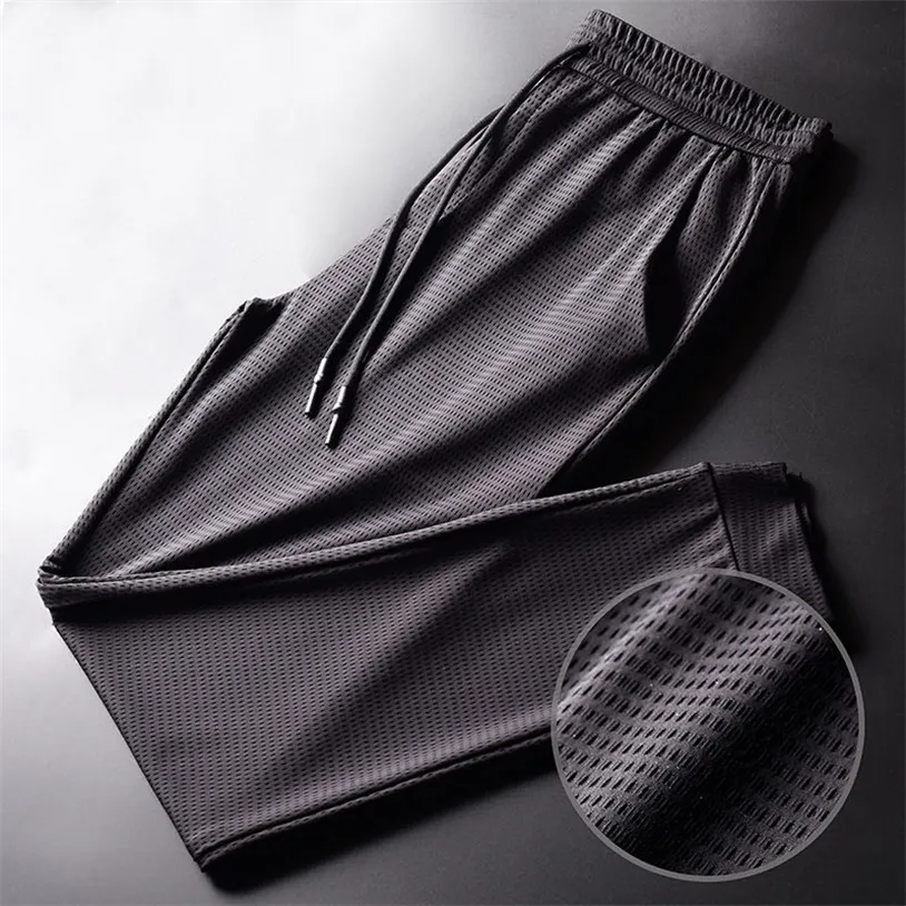 Męskie lato jedwabne spodnie siatki oddychające męskie przypadkowe cienkie sporty plus rozmiar spodnie szczupłe luźne 220325