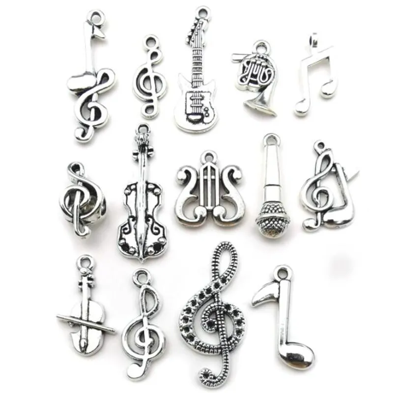 100pcs blandade charmar musikalisk gitarrnota piano fransk horn saxofon antikvitet silver hänge för att göra söta örhängen hängen halsband bijoux tillbehör