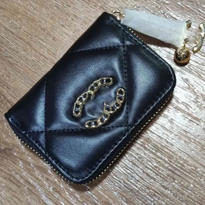 Diseñador de canal de cuero bolso pequeño bolso billetera Europa y América Moda para mujer para hombre Zero Wallet Nueva moneda versátil simple Min277u