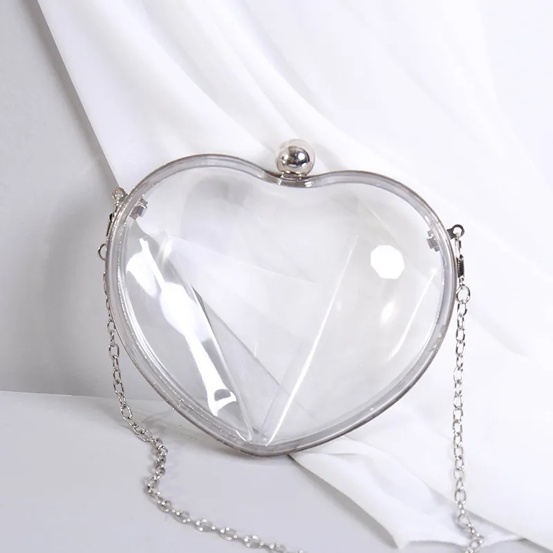 Nuevo Mini bolso de mano transparente de acrílico a la moda, bolso de mano para mujer con forma de corazón, bolso de cena, bolso de noche