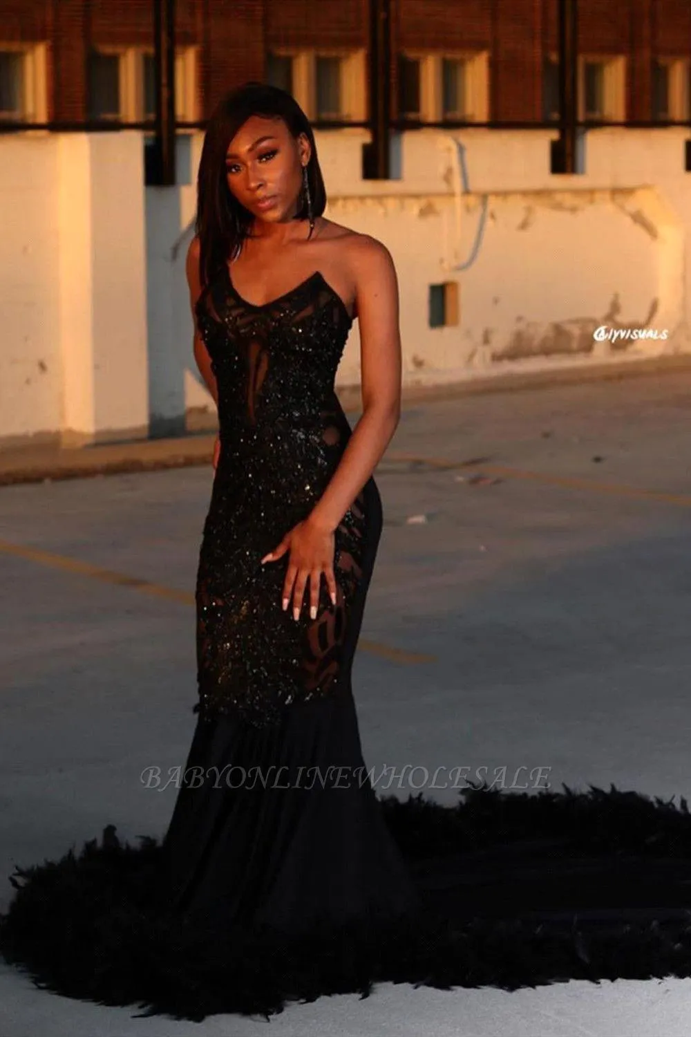 black feather prom dress