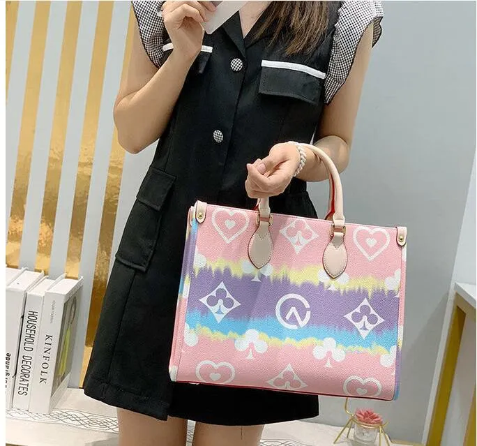 Borse firmate Nuova borsa femminile con sfumatura arcobaleno grande Borsa a tracolla per shopping bag in PVC stampata con borsa da donna di grande capacità