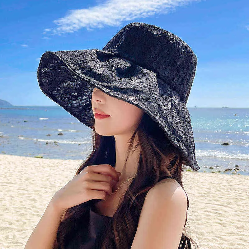 W117 Koreansk version av vår och sommar söt pärla spets blomma UV solskyddsmedel hatt stor kant skugga fiskare hatt kvinnor g220418