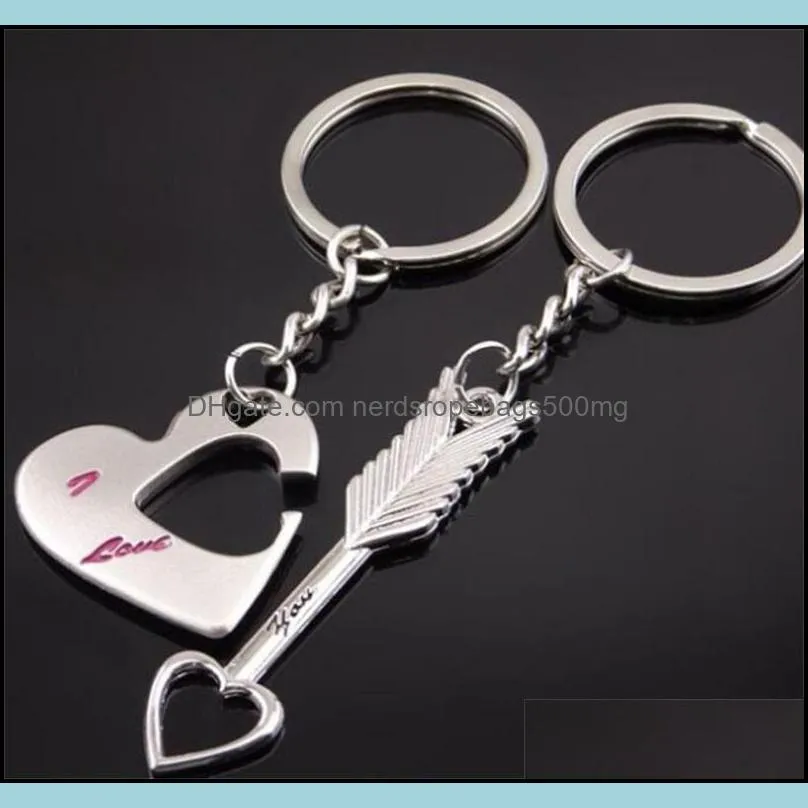 An arrow pierced mood lover key chain Qixi Valentine`s Day gift if buckle party party party special gifts gifts T3I51619 79 J2