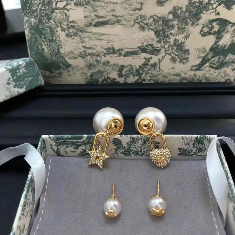 Estrellas de amor outlet llenas de pendientes asimétricos de perlas de diamante pendientes de oro claro para mujeres