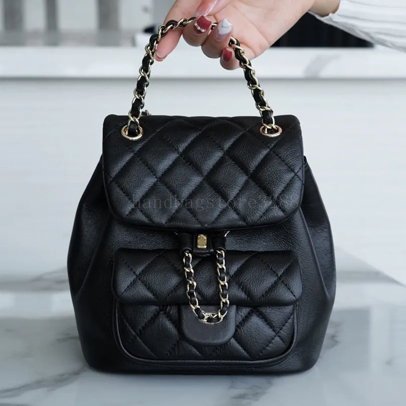 22c Mini Duma Rucksack Luxuriöse Designer-Handtasche aus hochwertigem Leder mit Diamanten, Rindsleder, schlichte Pochette, Ölwachs