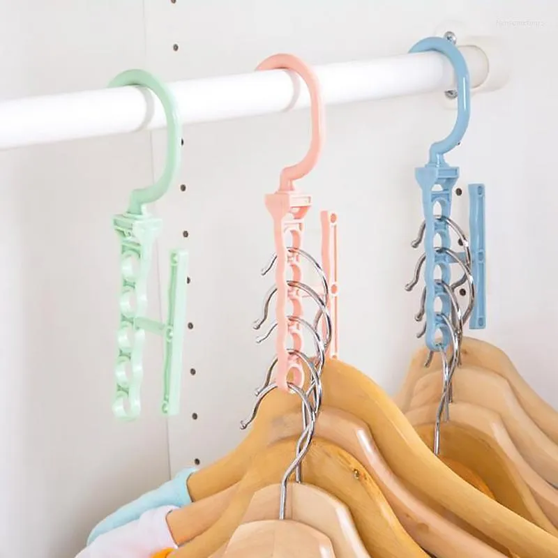 Hangers Racks Organizador de almacenamiento de plástico Ropa a prueba de viento de plástico Holleta de colgilla fija Hebilla Anti-Slip Hogar