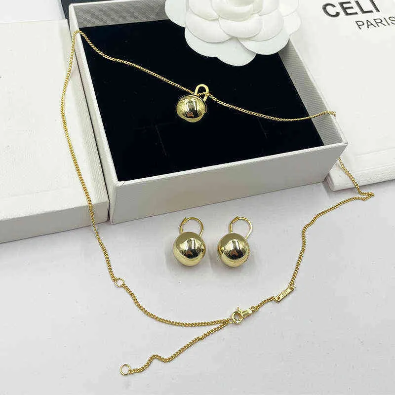 Celi solide Designer boule d'or petites boucles d'oreilles Ins Match maison visage lisse Simple à la mode personnalisé collier plaqué or