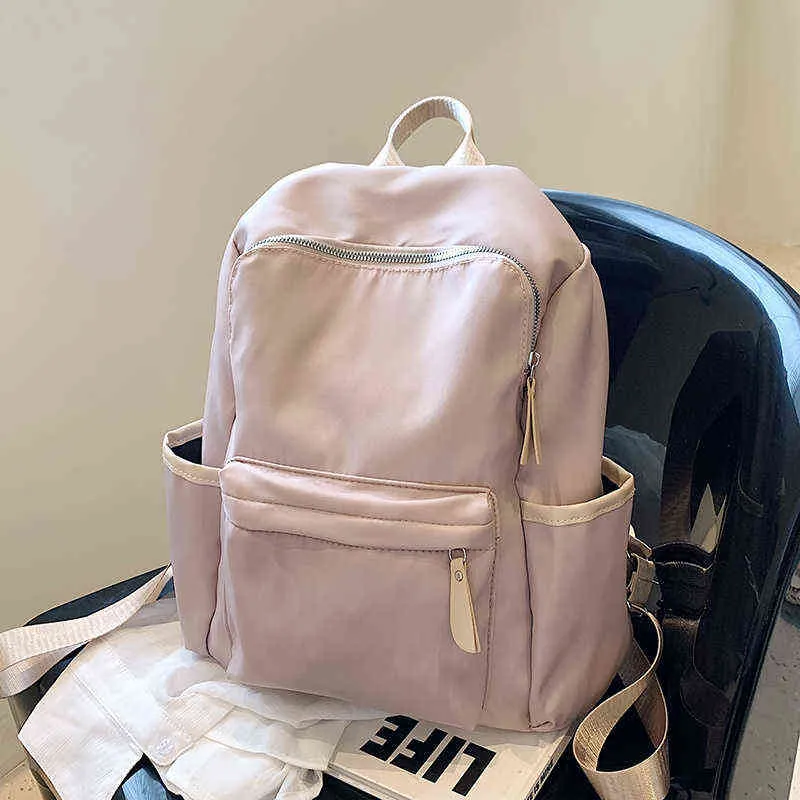 NXY School Torby Mały projektant Oxford Cloth Solid Color Backpack 2022 Luksusowa marka Mody Travel Book Bag Girls Powrót do 220802