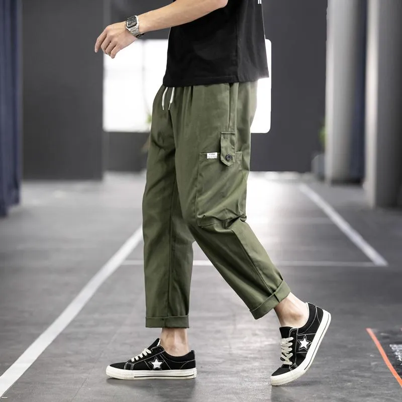 Calça masculina macacão masculino marca de maré de vários bolsos japoneses de algodão solto de hip-hop casual de feixes casuais
