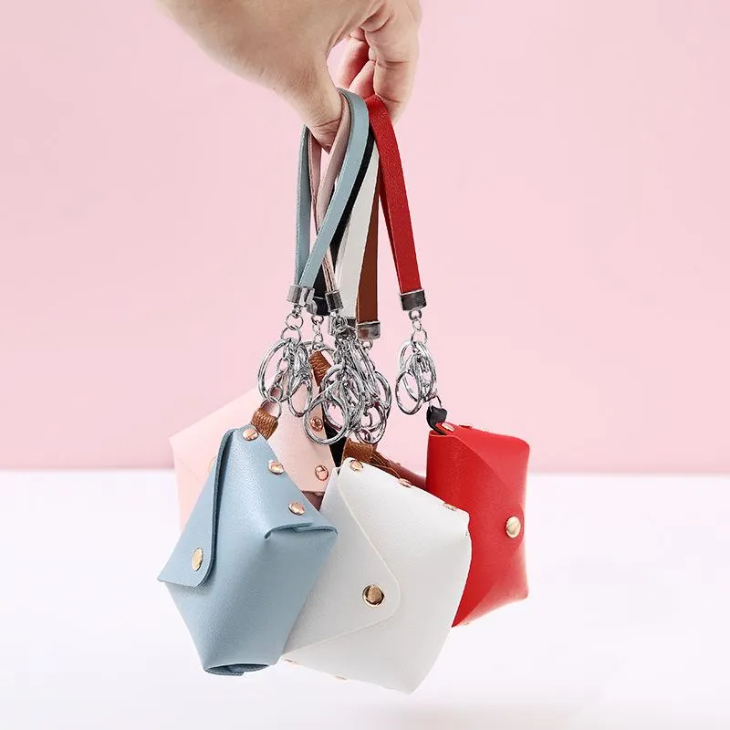 Keychains Mooie kleine handag -vormige sleutelhanger Creatieve vrouwen Auto Purse Pendant Keyring Ornament Friends Cadeau kleine tas munten juwelen in cadeau.