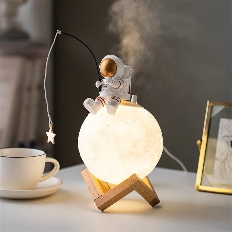 Figuritas de astronauta decoración del hogar resina espacio hombre miniatura luz nocturna humidificador máquina de niebla fría accesorios regalos de cumpleaños 220510