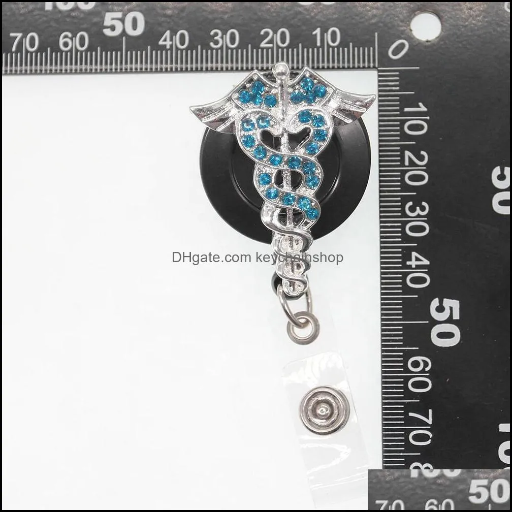 Wholesale Key Rings Rhinestone Nurse Medical Doctor Symbol Cossing With Two Wings ID Badge Reel