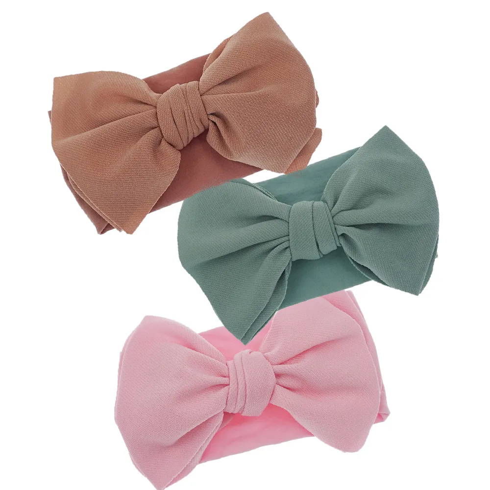 Vintage solide couleur bébé filles Nylon bandeau Turban nouveau-né tissu arc avec élastique Nylon bandeau infantile enfants cheveux accessoires