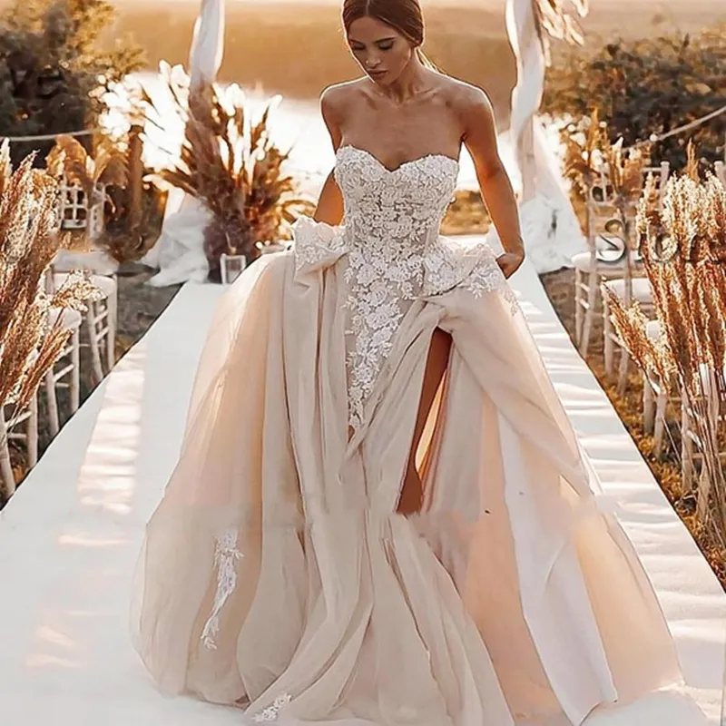 Abiti da sposa eleganti senza maniche Abiti da sposa Abiti da sposa Collo trasparente Pizzo senza spalline Paillettes applicate Treno lungo Spacco laterale alto Taglie forti Robe De Mariee Realizzato su misura