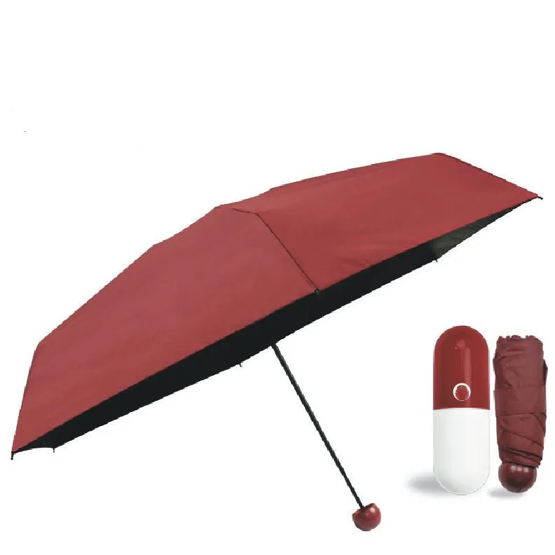 Capsule Umbrella Designer di marca Sunny Rain Mini Pocket Ombrelli pieghevoli antivento Protezione solare ultraleggera Ombrello da pioggia compatto C04