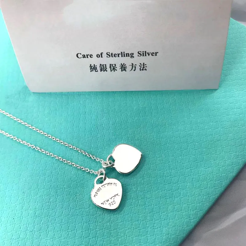 DHgate.com:Exquisite 925 Silver Double-Hearts Pendant