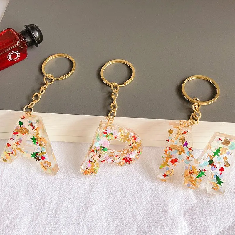 Porte-clés Wanglufei Noël 26 lettres résine pour femmes alphabet feuille sac pendentif charmes sac à main accessoires gland porte-clés