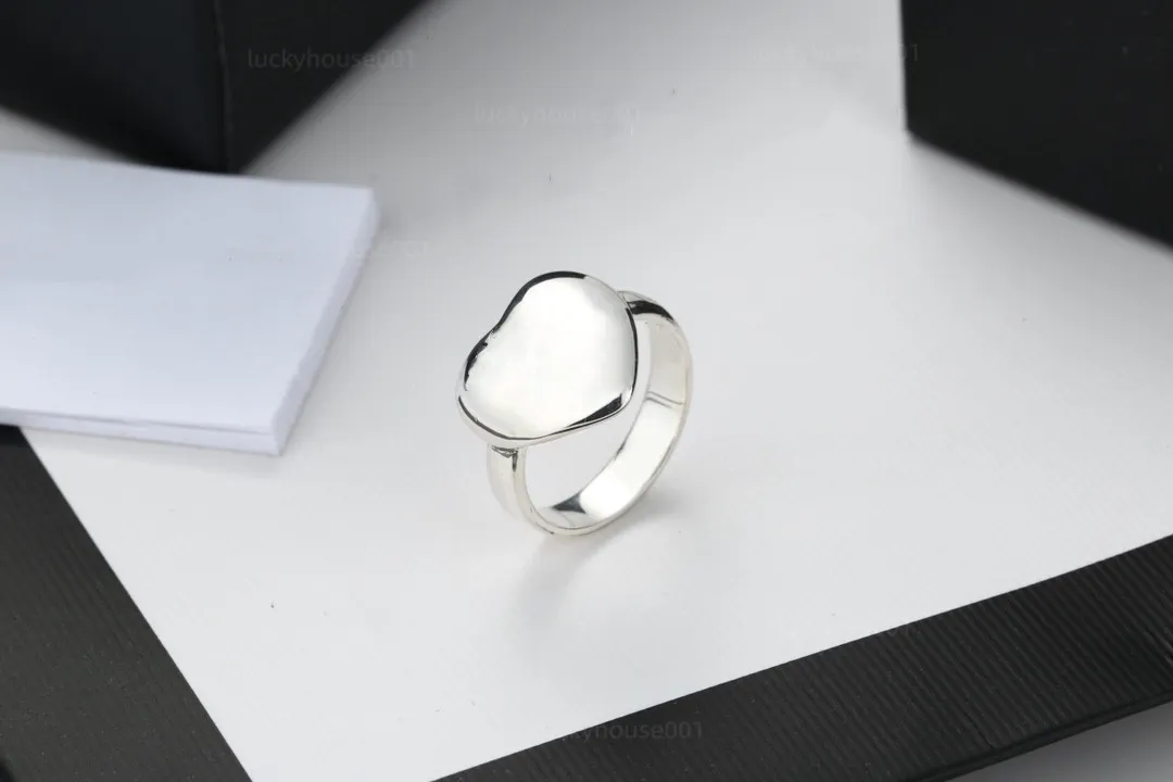 Pierścienie zespołu Nowa najwyższej jakości luksusowy prosty w kształcie serca miłość srebrna miłośnicy stali nierdzewnej pierścionka moda moda biżuteria ślubna