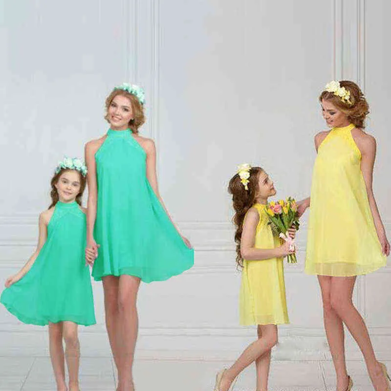 母娘の服ファッション家族は家族を一致させる服と娘の夏のドレス母と娘のドレス