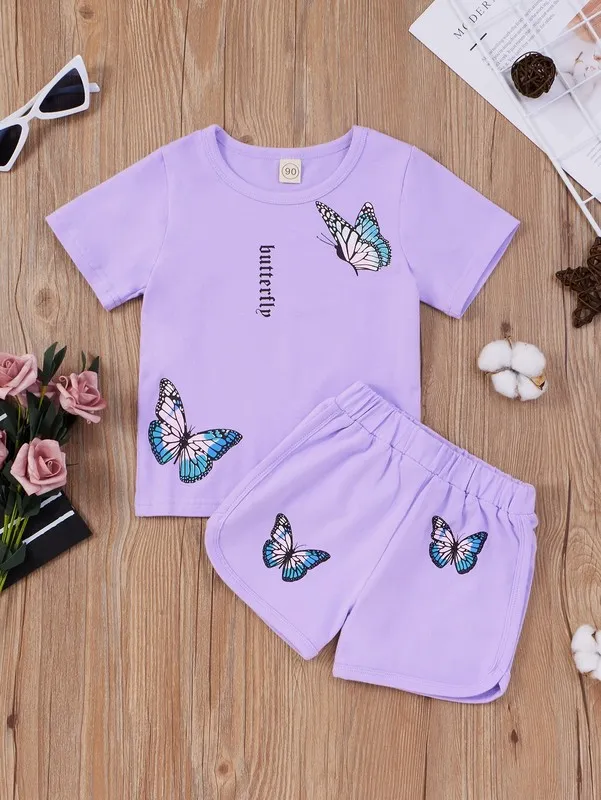 Kleine Mädchen-Buchstaben und Schmetterlings-T-Shirts und Shorts SIE