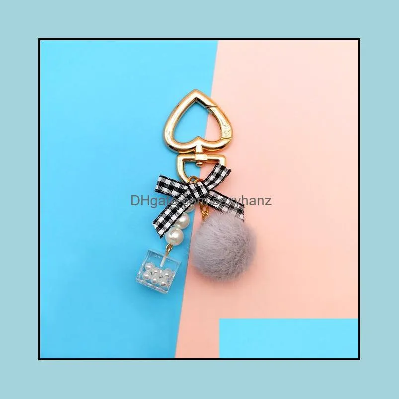 fashion pearl chain crystal bottle bow pompom keychain for women handbag key chain ring car fluffy puff ball keychains jewelry