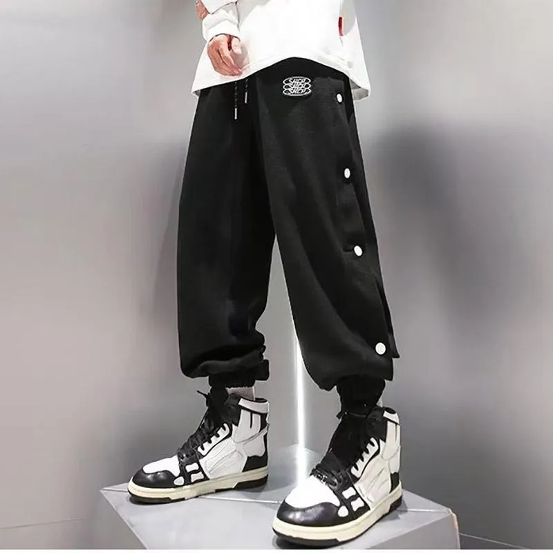 Erkek pantolon Japon moda erkekler hip hop ince bahar yaz düğmesi her iki yan pantolon benzersiz tasarım genç gevşek düz pantolon