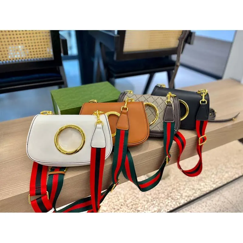 Metallic zadel schoudertassen ontwerpers mannen vrouwen mode klassieke handtassen portemonnees brede schouderriem dubbele hoge kwaliteit met doos