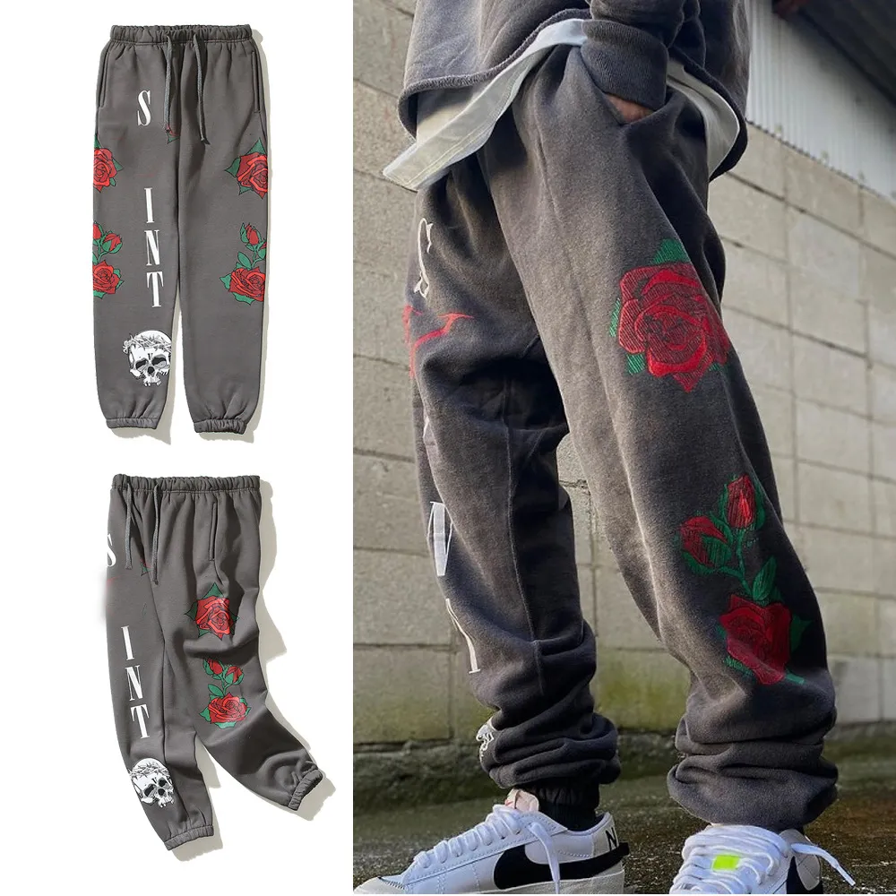 Pantalones grises Pantalones de chándal Hombres Mujeres Estampado de rosas Cintura elástica de alta calidad Pantalón unisex Joggers Pantalones con cordón