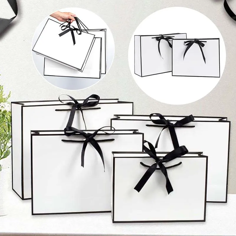 Scatola da regalo Confezione nera Borsa portatile in cartone bianco per vacanze di nozze d'affari Materiali da imballaggio di lusso con fiocco in pizzo