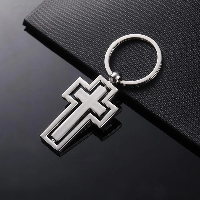 Porte-clés cadeaux religieux porte-clés en métal personnalité rotation croix porte-clés voiture pendentif activité par articles cadeaux personnalisés K2401