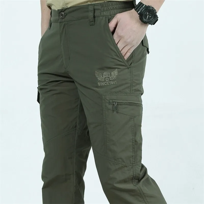 Spodnie taktyczne Mężczyźni Szybkie sucha armia armii migger multi kieszeni wojskowe czarne męskie spodnie oddychające Plus Size 4xl 201109