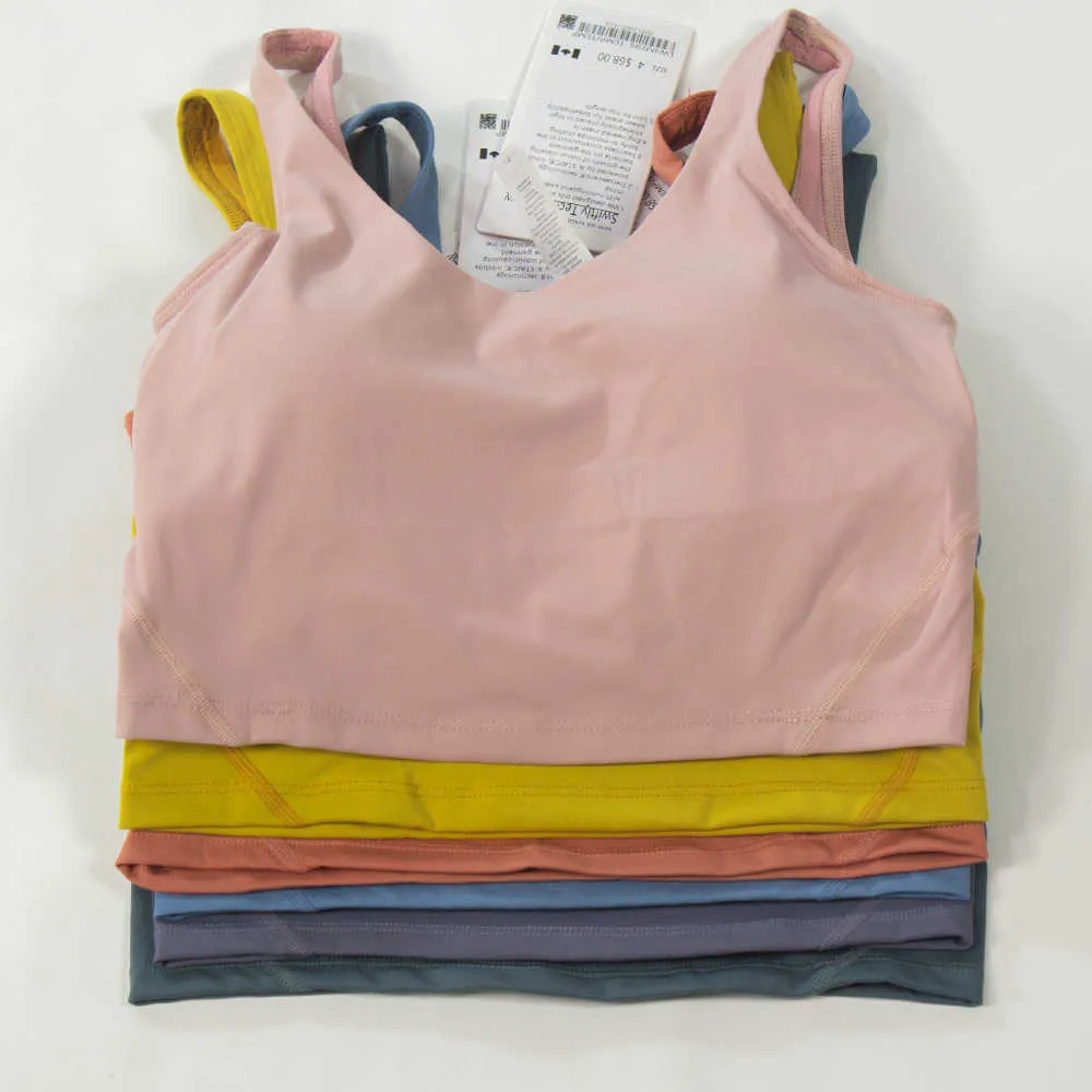 I vestiti da yoga allineano il gilet sportivo da donna, il reggiseno a U, il fitness, il jogging con il pettorale foderato, la biancheria intima da palestra