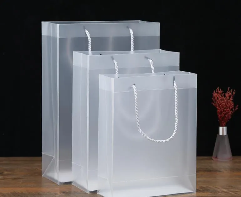 Brocada de presente 8 Tamanho Sacos de presente de plástico de PVC com alças transparentes transparentes de PVC-BAG Clear Bolsa Favors Favors Bag do logotipo personalizado SN4575