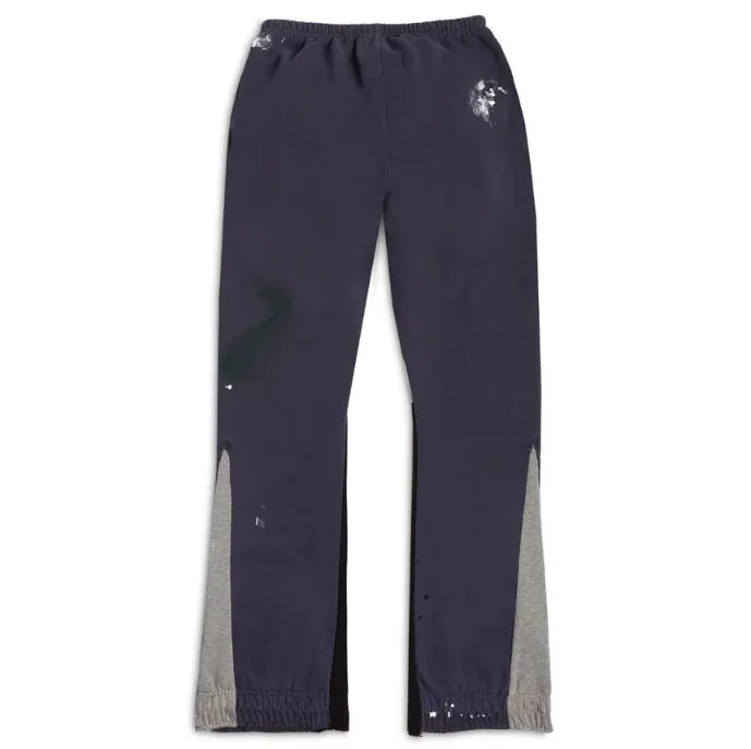 Pantaloni casual vecchi lavati con graffiti di High Street