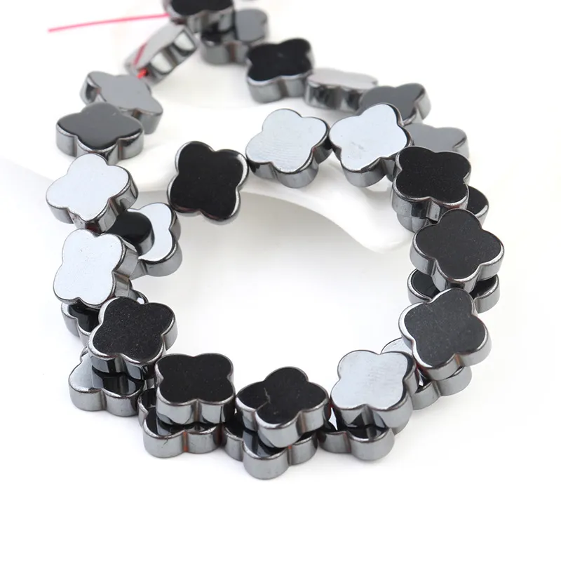 Löst tvärhematitstenpärlor för DIY -tillverkning av smycken Armband Halsband Anklet Flate Gemstone 4 Leaf Spacer Black Magnetite Ingen magnetisk kraft