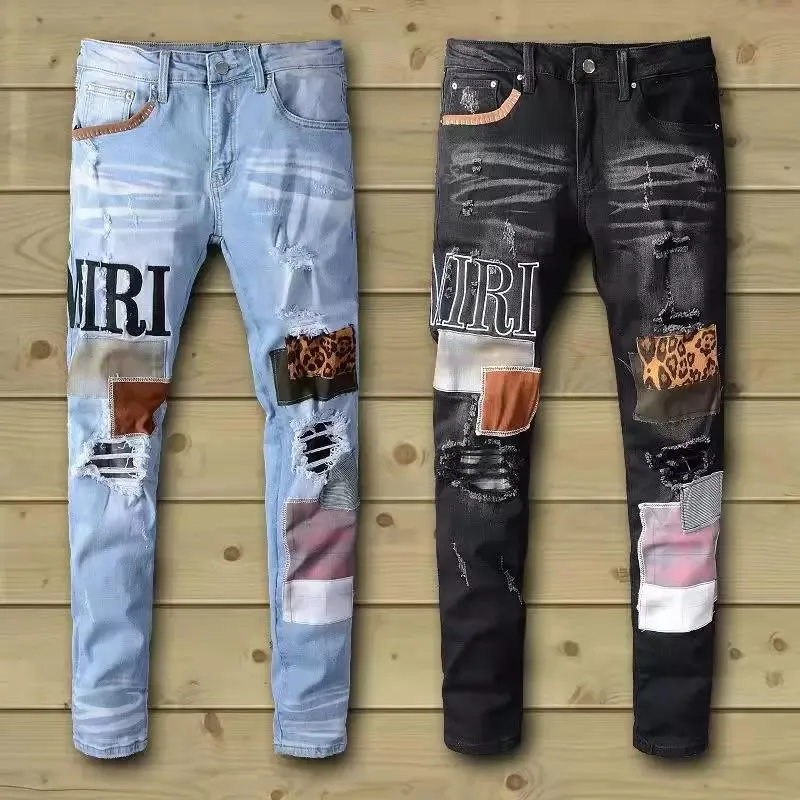 QNPQYX Nuevos pantalones vaqueros de mezclilla para hombre tendencia casual pantalones estampados delgados para hombres mujeres en Europa y America