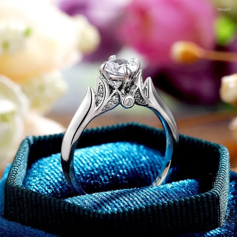 Bröllopsringar huitan ly design kvinnor finger låg nyckel rund kubik zirkonium kvinnlig förlovningsring eleganta tillbehör juvelering rita22