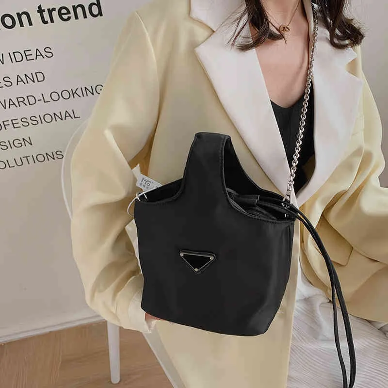 Evening Bags Purses female new nylon waterproof hand Triangle standard drawstring vegetable basket hand mahjong bag