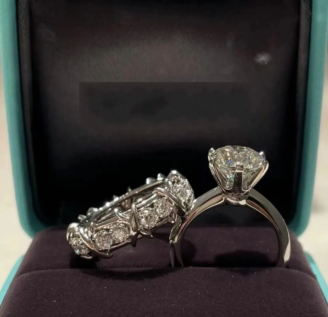 2022 Anéis de casamento mais vendidos clássicos seis garras jóias de moda simples esterlina Sier Gold preenchimento redondo recortado Moissanite Diamond Eternity Women Women Bridal Casal Ring