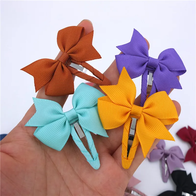 Nya 2 -tums flickor Grosgrain Ribbon Bow Hair Clip Kids Ribbon Hair Pins Helt fodrade Bow Hair Clip Barrettes