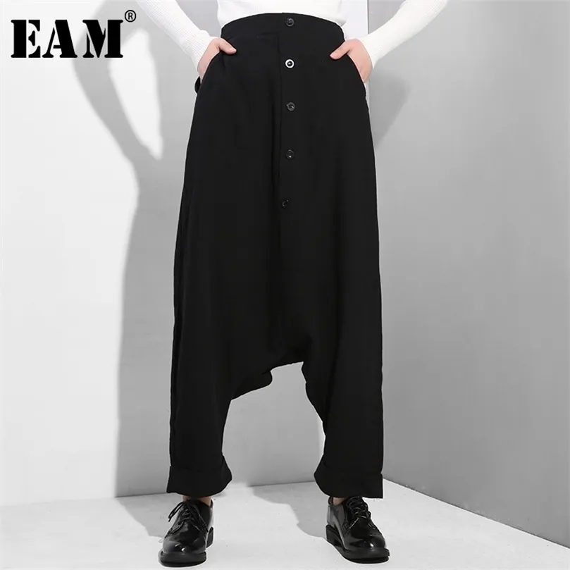 EAM 2020 nouveau printemps automne taille haute élastique bouton noir joint fendu mince ample croix pantalons femmes pantalons mode LJ201029
