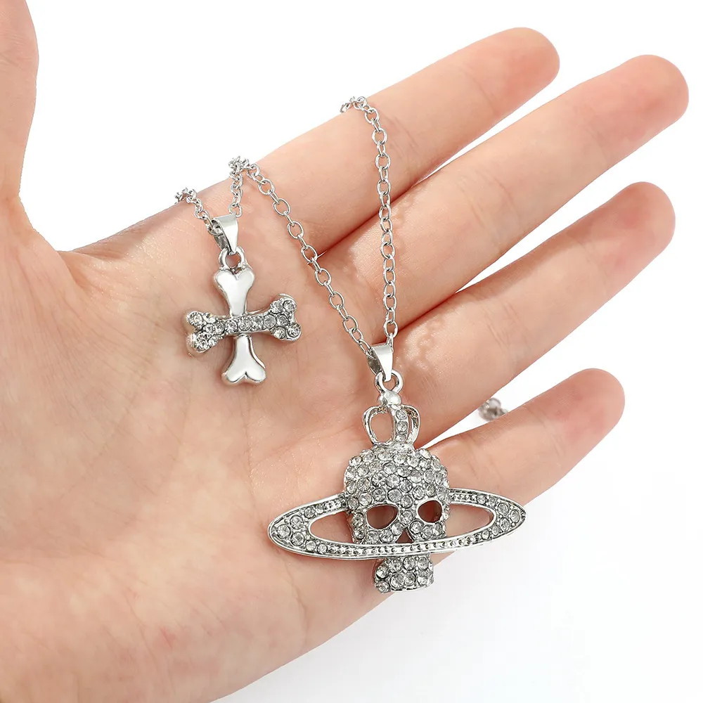 ☆ DHgate 추천 핫 아이템: 토성 행성 목걸이 : 여성, 할로윈, 크리스마스를위한 고딕 두개골 크로스 뼈 펑크 펜던트