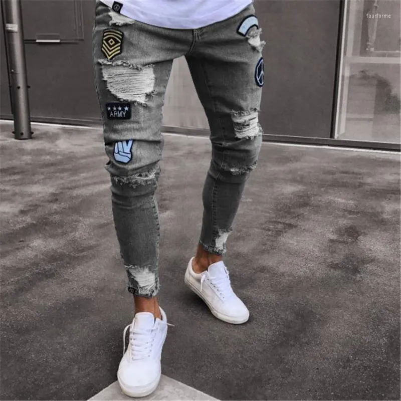 Jeans män hip hopp rippade tröjor mager motorcykel denim byxor blixtlås designer svart herr casual byxor