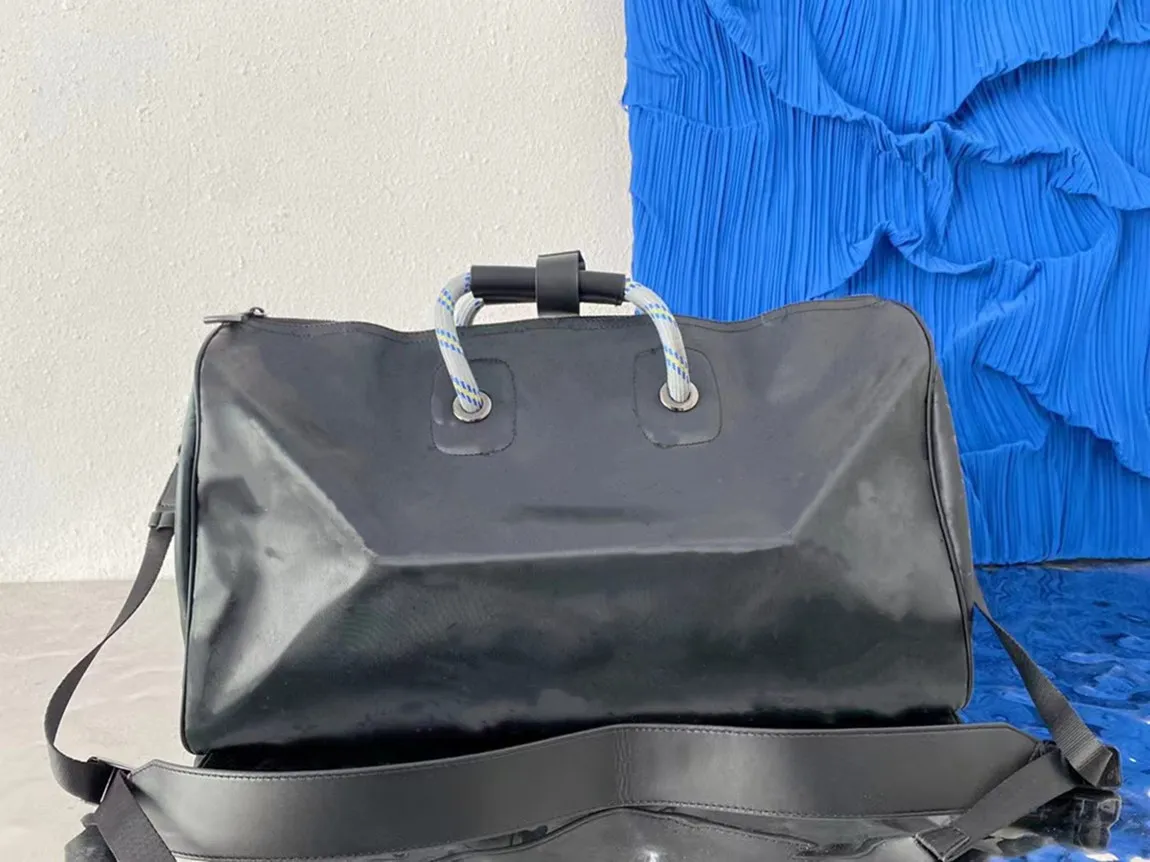 Duffle tas klassieke 50 cm reisbagage voor mannen topkwaliteit vrouwen bakken schouder plugzakken heren dames handtassen laser handtas